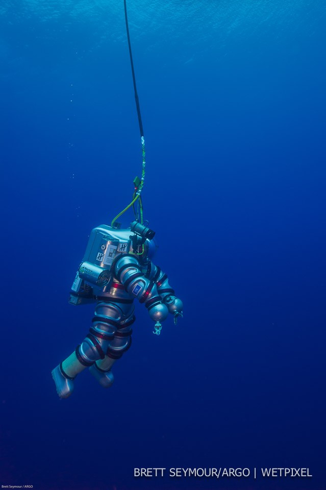 The Exosuit descends into the waters of Antikythera Greece.